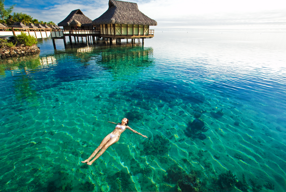 Woman swimming in a lagoon