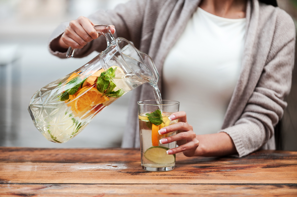 Woman having detox water